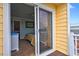 Bedroom view showing a slider to a private deck plus ensuite bath at 39 Newport St., Ocean Isle Beach, NC 28469