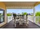 A beautifully covered outdoor deck provides a relaxing space to enjoy the calming waterway views at 39 Newport St., Ocean Isle Beach, NC 28469