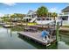 This private dock, equipped with seating and a ladder, provides direct access to the tranquil waterway at 39 Newport St., Ocean Isle Beach, NC 28469