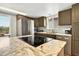 Bright kitchen features stainless appliances, marble counters and tile backsplash at 39 Newport St., Ocean Isle Beach, NC 28469