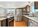 Modern kitchen features stainless steel appliances and light gray backsplash at 39 Newport St., Ocean Isle Beach, NC 28469