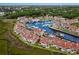 Breathtaking aerial showing condos surrounded by a marina, perfect for boating enthusiasts at 4396 Baldwin Ave. # 30, Little River, SC 29566
