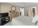 Relaxing bedroom showcases a plush bed, wooden dresser, and doorway to the en-suite bathroom at 4396 Baldwin Ave. # 30, Little River, SC 29566