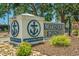 Mariners Pointe sign, a private waterway community, with anchor logos and landscaping at 4396 Baldwin Ave. # 30, Little River, SC 29566