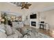 Spacious open-concept living area with vaulted ceilings, a fireplace, and modern decor at 4396 Baldwin Ave. # 30, Little River, SC 29566