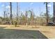 Backyard of a home with a lawn and privacy landscaping at 4486 Little River Inn Ln. # 2103, Little River, SC 29566