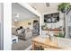 Inviting dining area with views into a comfortable living room and natural light at 4486 Little River Inn Ln. # 2103, Little River, SC 29566
