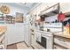 Traditional kitchen design with white appliances, ample storage, and decorative accents at 4486 Little River Inn Ln. # 2103, Little River, SC 29566