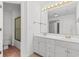 Bathroom featuring double sink vanity, tile flooring, and shower/tub combo at 4505 Lightkeepers Way # 24B, Little River, SC 29566