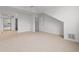 Spacious bedroom with ensuite bathroom access and neutral carpeting at 4505 Lightkeepers Way # 24B, Little River, SC 29566
