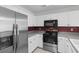 Well-appointed kitchen featuring ample counter space and modern appliances at 4505 Lightkeepers Way # 24B, Little River, SC 29566