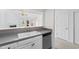 Bright kitchen featuring a breakfast bar and view into the living area at 4505 Lightkeepers Way # 24B, Little River, SC 29566
