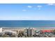Aerial view of condo property facing the beach and ocean with many units at 4505 S Ocean Blvd. # 5D, North Myrtle Beach, SC 29582