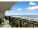 Relax on the balcony with ocean views, a perfect spot to enjoy the beach at 4505 S Ocean Blvd. # 5D, North Myrtle Beach, SC 29582