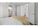 Bedroom featuring access to the bathrooms and wood style floors throughout the room at 4505 S Ocean Blvd. # 5D, North Myrtle Beach, SC 29582