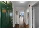 View from the front door into the condo featuring luxury vinyl flooring, an ocean view, and open floorplan at 4505 S Ocean Blvd. # 5D, North Myrtle Beach, SC 29582