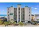 A full shot of the Beach Club III building highlighting its multiple floors, balconies, and proximity to the ocean at 4505 S Ocean Blvd. # 5D, North Myrtle Beach, SC 29582