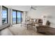 Comfortable living room with ocean views and balcony access at 4505 S Ocean Blvd. # 5D, North Myrtle Beach, SC 29582