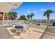 Enjoy outdoor living on the patio with beautiful palm trees at 4505 S Ocean Blvd. # 5D, North Myrtle Beach, SC 29582