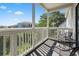 Serene screened-in porch features a lovely community view with comfortable seating at 4510 Little River Inn Dr. # 2708, Little River, SC 29566