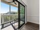 Cozy screened balcony with seating offers outdoor living and a view of the neighborhood at 4510 Little River Inn Dr. # 2708, Little River, SC 29566