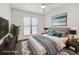 Virtually staged bedroom featuring a bed, decor, hardwood floors, and white walls at 4510 Little River Inn Dr. # 2708, Little River, SC 29566