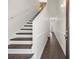 Inviting foyer with modern staircase and beautiful wood-look flooring at 4510 Little River Inn Dr. # 2708, Little River, SC 29566
