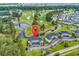 Breathtaking aerial view showcases condo community next to a scenic golf course with lush landscaping at 4811 Orchid Way # 301, Myrtle Beach, SC 29577