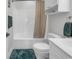 Bright bathroom featuring a shower/bath combo, toilet, and vanity at 4811 Orchid Way # 301, Myrtle Beach, SC 29577
