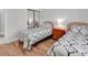 This bedroom features twin beds, a mirrored closet, and hard wood floors at 4811 Orchid Way # 301, Myrtle Beach, SC 29577