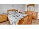 Bright bedroom features natural light and wood floors at 4811 Orchid Way # 301, Myrtle Beach, SC 29577