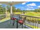 Enjoy breathtaking golf course views from this cozy outdoor patio seating area at 4811 Orchid Way # 301, Myrtle Beach, SC 29577