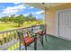 Relaxing patio seating area overlooks beautiful pond and golf course at 4811 Orchid Way # 301, Myrtle Beach, SC 29577