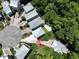 Aerial view of the property in a cul-de-sac, featuring landscaping, and driveway at 52 Fish Shack Alley, Murrells Inlet, SC 29576