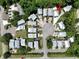 Aerial view of home nestled in a community, with landscaping, and mature trees at 52 Fish Shack Alley, Murrells Inlet, SC 29576