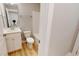 Bathroom with white cabinets, toilet and bathtub at 52 Fish Shack Alley, Murrells Inlet, SC 29576