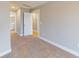 Neutral bedroom with plush carpet and white trim, open to the en-suite bathroom at 52 Fish Shack Alley, Murrells Inlet, SC 29576