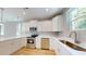 A bright kitchen featuring quartz countertops and stainless steel appliances at 52 Fish Shack Alley, Murrells Inlet, SC 29576