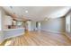 An open-concept design featuring hardwood floors, recessed lighting, and easy access to the kitchen at 52 Fish Shack Alley, Murrells Inlet, SC 29576