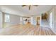 Open-concept space featuring hardwood floors, recessed lighting, and a staircase at 52 Fish Shack Alley, Murrells Inlet, SC 29576