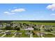 Aerial view of a home in a peaceful community surrounded by lush greenery at 520 Winged Elm St., Loris, SC 29569