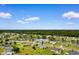 Aerial view of a home in a waterside community with lush surroundings at 520 Winged Elm St., Loris, SC 29569