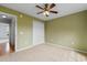 Bedroom featuring a closet and neutral carpet with a view into the hallway at 520 Winged Elm St., Loris, SC 29569