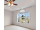 Bedroom with large window that lets in lots of natural light and a ceiling fan at 520 Winged Elm St., Loris, SC 29569