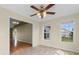 Dining room with tile flooring, a ceiling fan, and a big window at 520 Winged Elm St., Loris, SC 29569