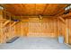 Interior view of storage shed with ample room and shelving for organization at 520 Winged Elm St., Loris, SC 29569