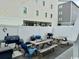 Private fenced backyard with picnic tables and BBQs, perfect for outdoor entertaining at 5409 N Ocean Blvd. # 111, North Myrtle Beach, SC 29582