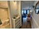 Hallway view with decor and entrance to the bathroom and living room at 5409 N Ocean Blvd. # 111, North Myrtle Beach, SC 29582
