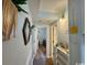 Hallway view with stylish decor and easy access to different areas of the home at 5409 N Ocean Blvd. # 111, North Myrtle Beach, SC 29582