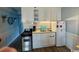 Efficient kitchen with white cabinets, stainless steel appliances, and a clean, functional design at 5409 N Ocean Blvd. # 111, North Myrtle Beach, SC 29582